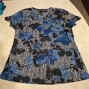 KOI Women's Blue and Black Floral Scrub Top